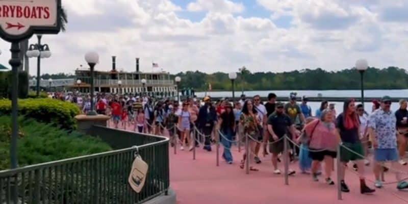 Walt Disney World Resort crowds walking toward the entrance to Magic Kingdom Park from the ferryboat.