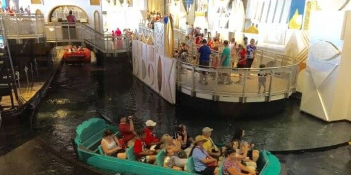 Guests at the beginning of "it's a small world" at Magic Kingdom Park.