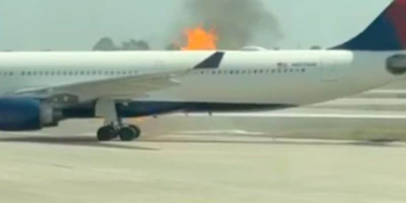 A Delta Airlines plane on fire at Orlando International Airport.