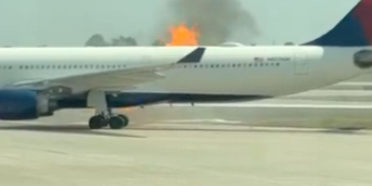 A Delta Airlines plane on fire at Orlando International Airport.