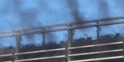 Smoke rising out of the Pixar Pals Parking Garage at Disneyland Resort during a car fire.