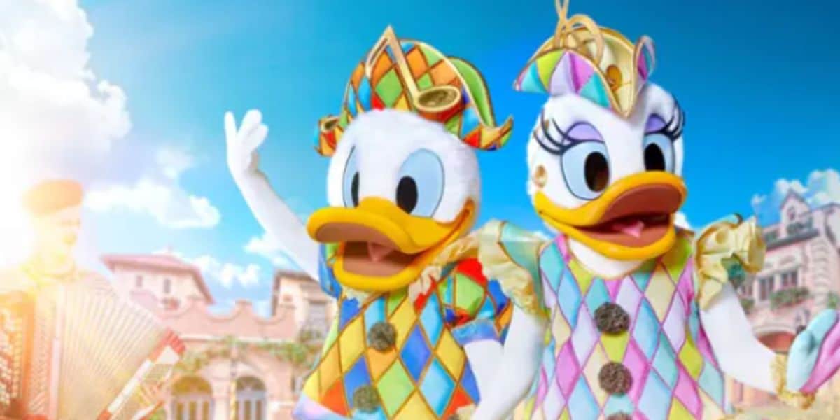 Donald Duck and Daisy Duck in colorful costumes for the Disney Music Festival