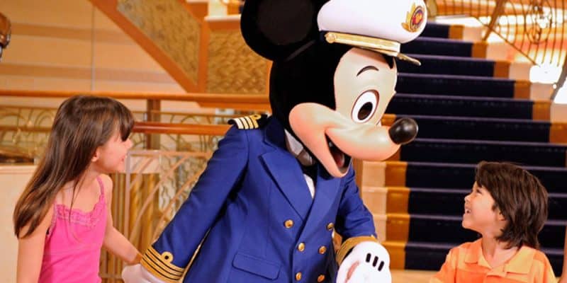 Two kids with Mickey Mouse
