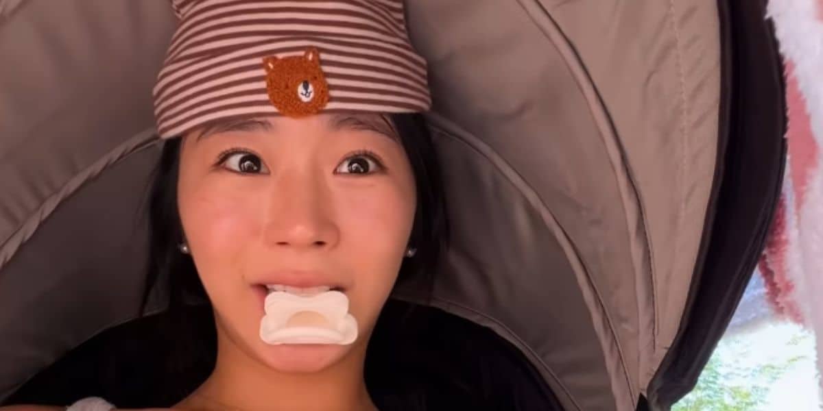 An adult person sneaking into a Disney theme park in a stroller.