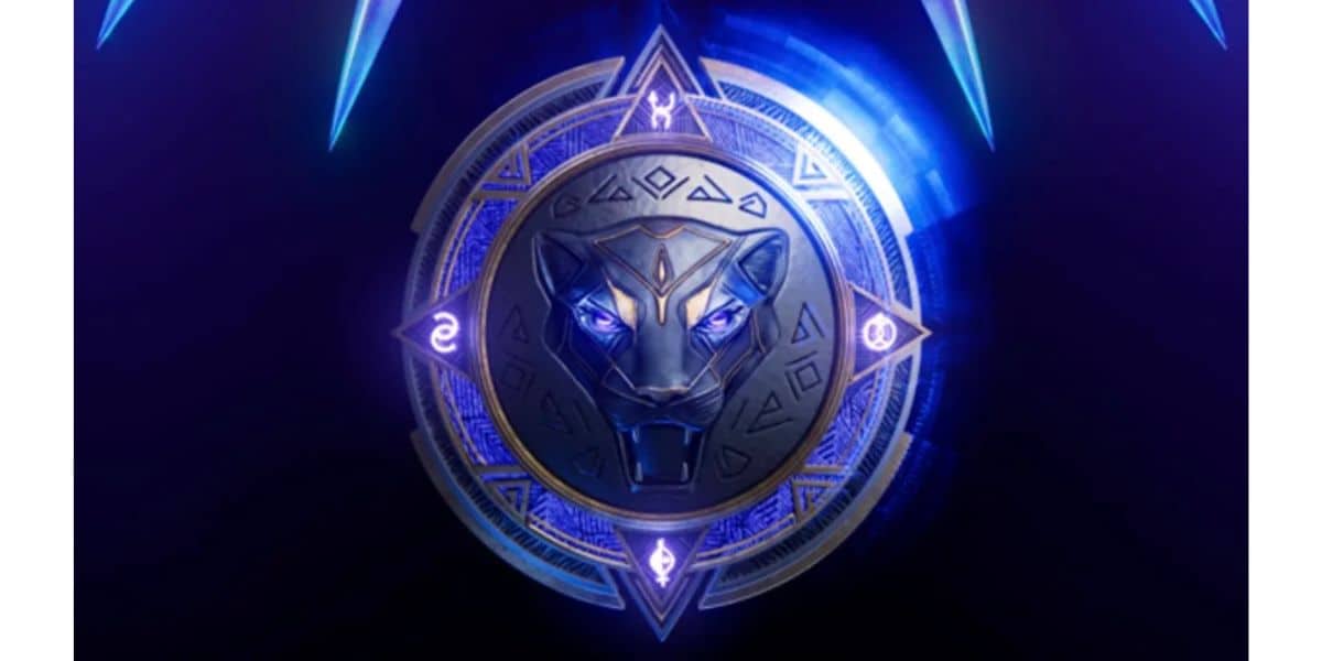 A circular emblem features a stylized Black Panther face with glowing blue eyes, intricate patterns, and mystical symbols around the border, set against a dark blue glowing background—an homage to a project scrapped after the studio shut down.