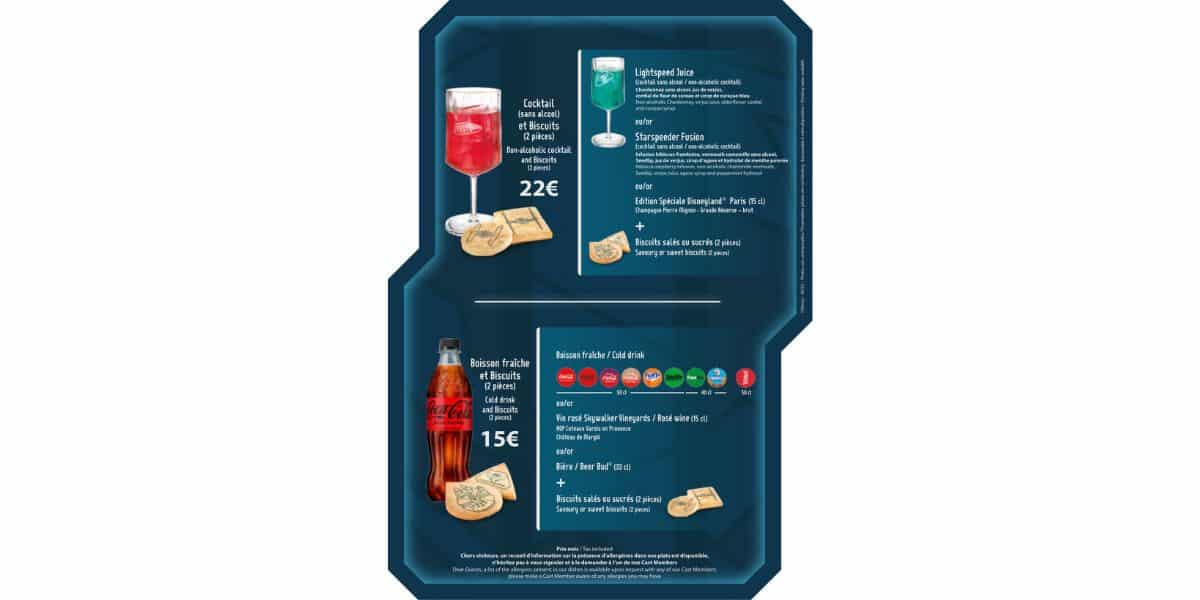 A menu showing two drink options with themed biscuits at Disney Park Prices: a red and blue layered cocktail for 22€, and a choice of Coca-Cola or other soft drinks for 15€. Descriptions and icons for allergens are also included.