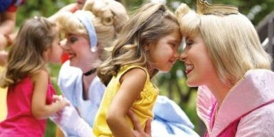Two young girls meet Cinderella and Aurora, two Disney World Princesses.