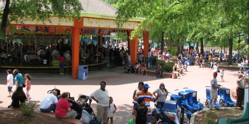 Crowds in front of a carousel at Carowinds.