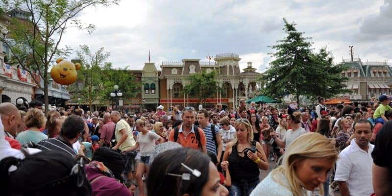 Crowds of Disney Park guests on Main Street USA at Disneyland Paris, a Disney park in France where numerous Disney ride closures will be taking place soon.