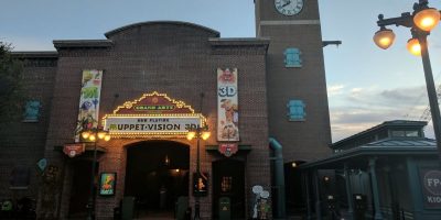 The entrance to Muppet*Vision 3D at dusk.