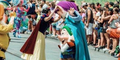 Snow White and Dopey during the Festival of Fantasy Parade at the Magic Kingdom