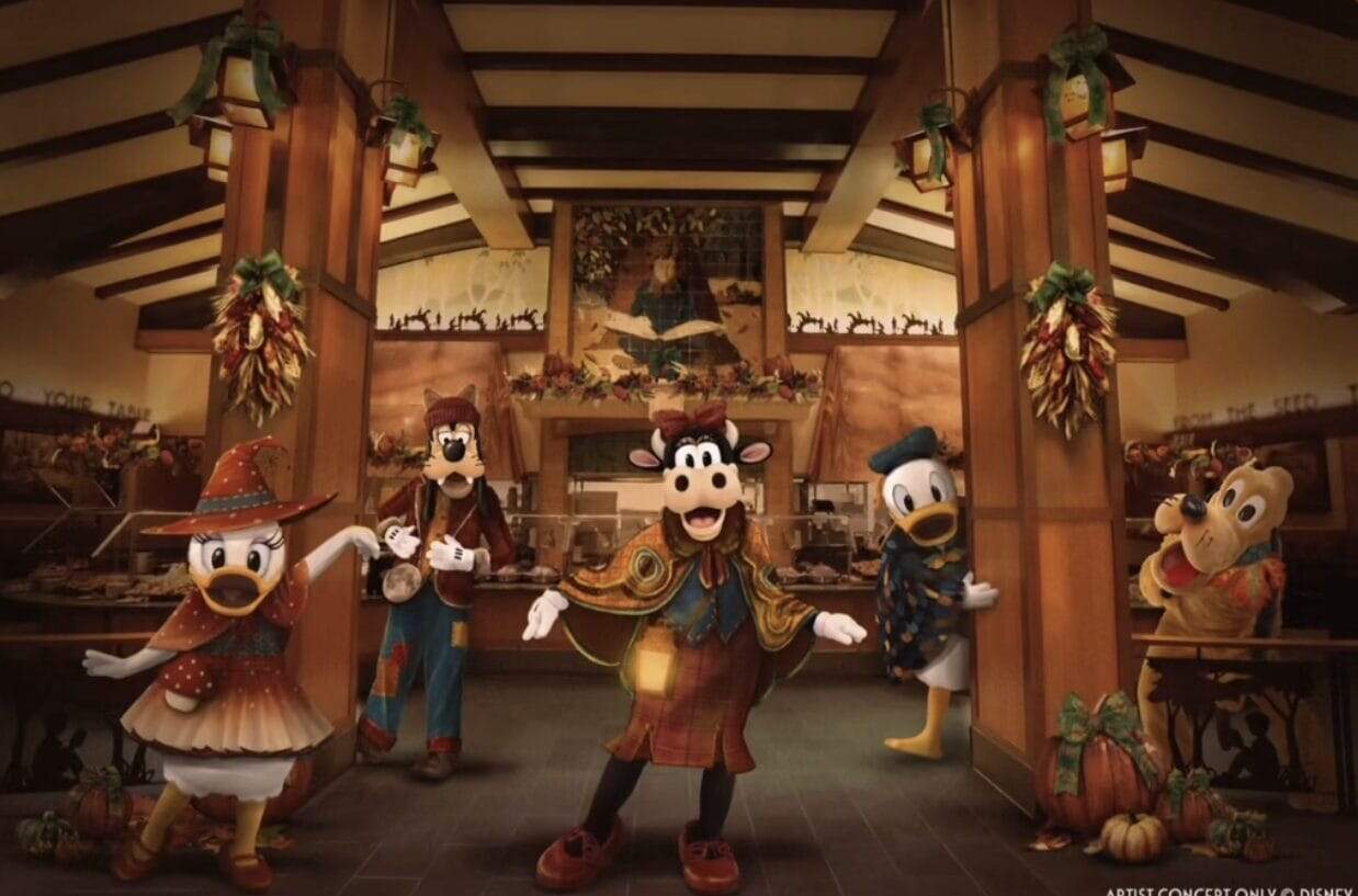 Daisy Duck, Goofy, Clarabelle Cow, Donald Duck, and Pluto, all in autumn-themed outfits, stand in a festively decorated room with pumpkins and hanging lanterns at the Disneyland Halloween Buffet at Storyteller's Cafe