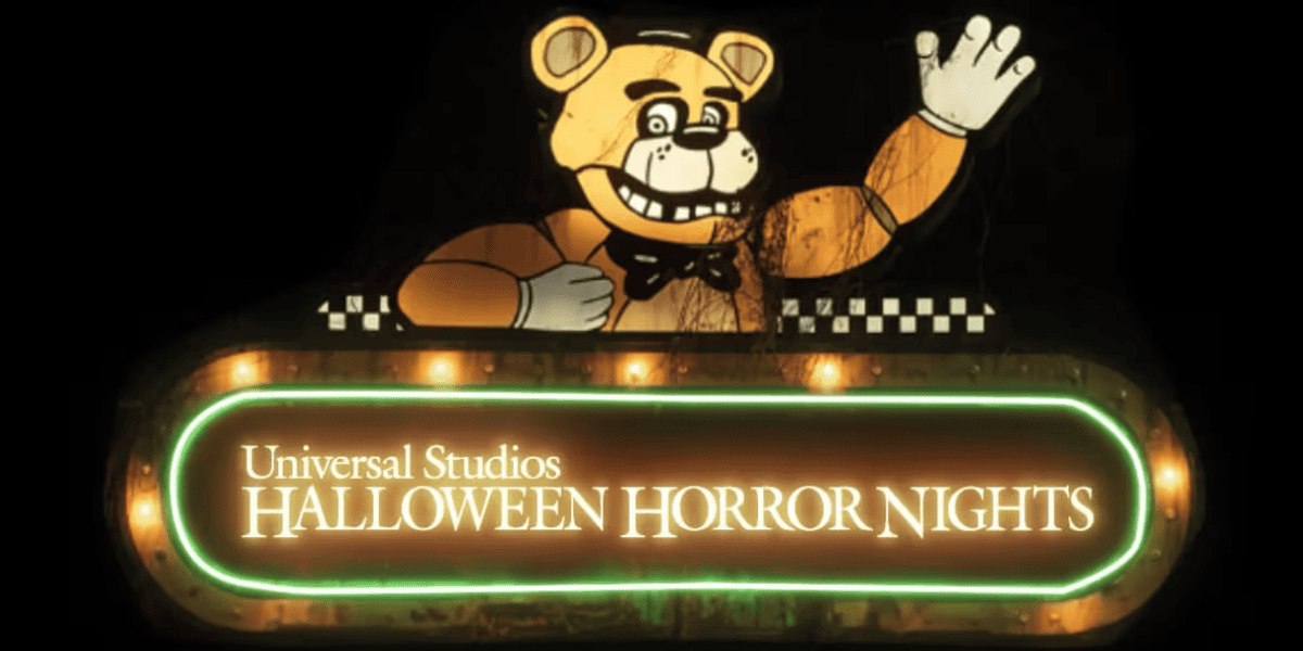 An illuminated sign shows an animatronic bear waving above the words "Universal Studios Halloween Horror Nights" in glowing white and green text, hinting at an exciting announcement coming to Universal Orlando next week. The scene has a spooky, dark background.