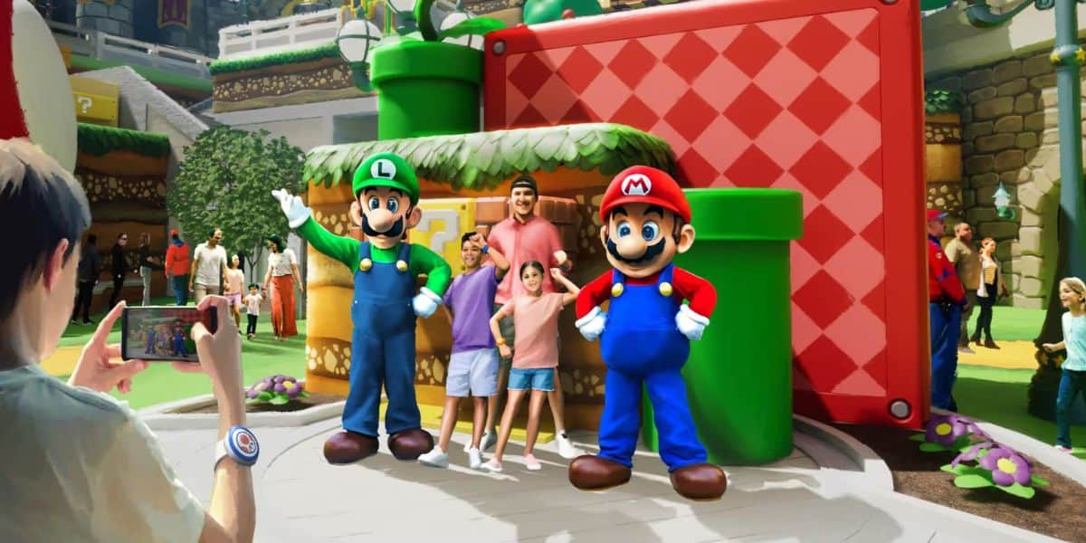 A family poses with Mario and Luigi in Super Nintendo World at Epic Universe