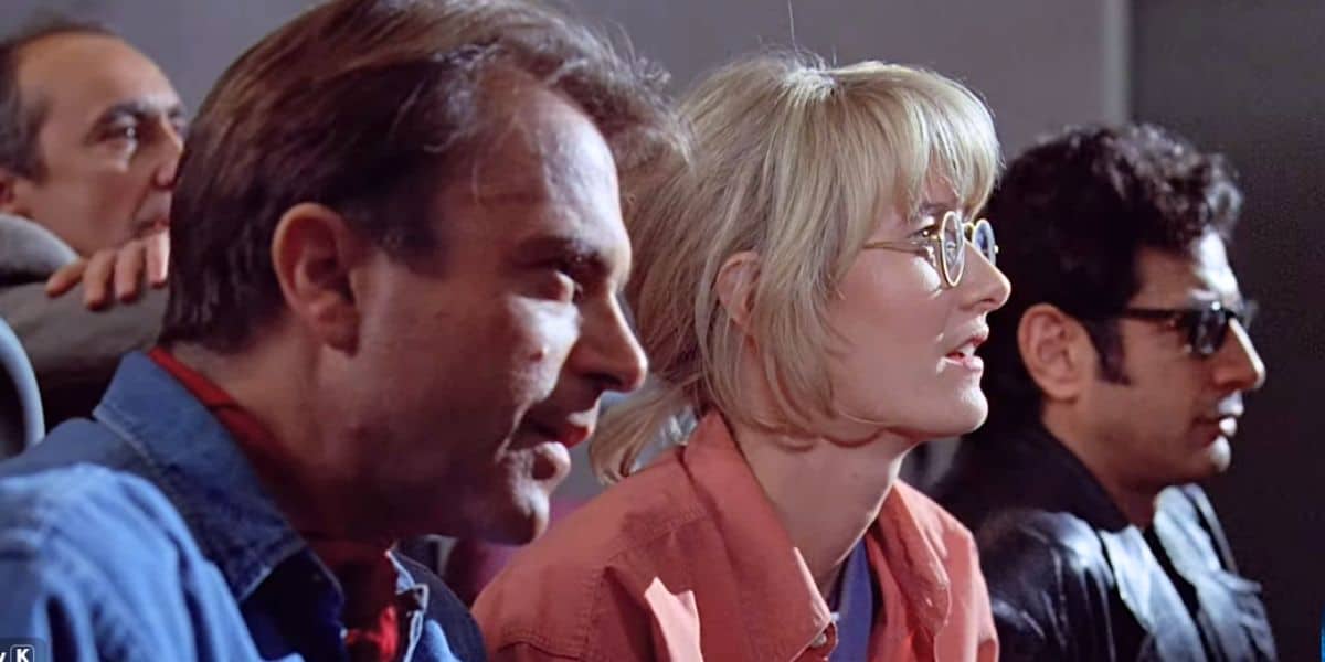L to R: Donald Gennaro, Alan Grant, Ellie Sattler, and Ian Malcolm watching the Mr. DNA film in 'Jurassic Park'