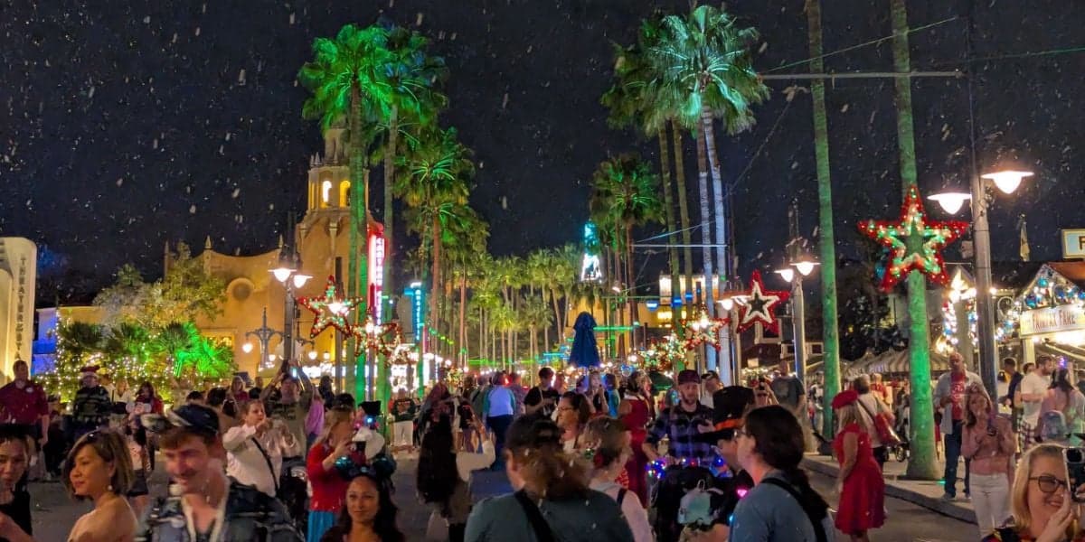A bustling Hollywood Boulevard during Disney Jollywood Nights at Disney's Hollywood Studios