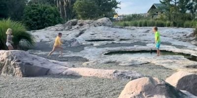 Three children play in a geyser at Walt Disney World Resort's Wilderness Lodge in a video that raised questions about parenting on vacation.
