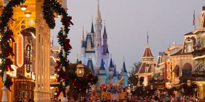 People on Main Street, U.S.A., during Mickey's Very Merry Christmas Party.
