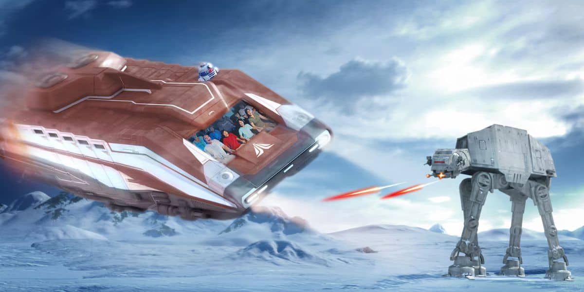 A spaceship ride at Star Tours Disneyland flies over a snowy landscape, dodging red laser blasts from a four-legged robotic walker under a cloudy sky.