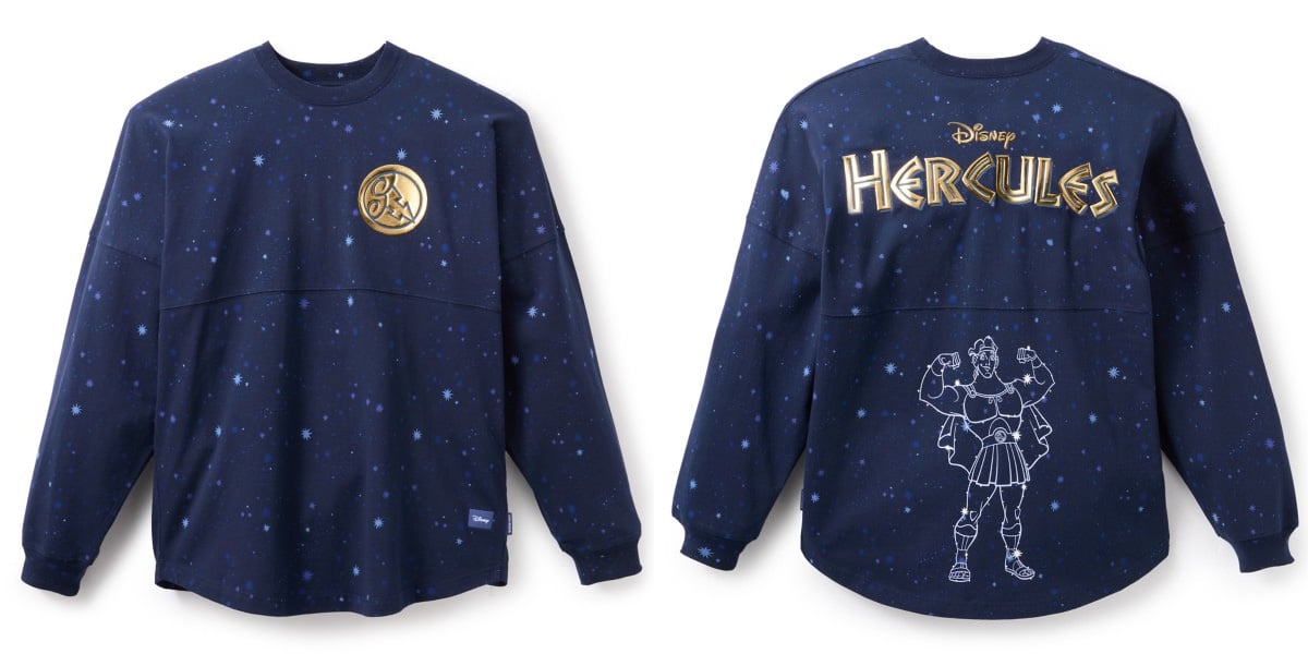 A navy blue Spirit Jersey with a starry pattern. The front displays a gold "H" emblem while the back features "Disney Hercules" in gold and an outline of the hero flexing his muscles.