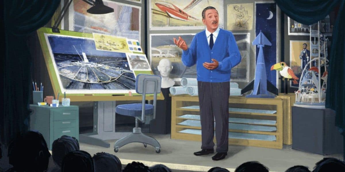 An animated man in a blue sweater stands on a stage, speaking to an audience. Behind him are sketches, a model rocket, and a large drawing board with designs, suggesting a presentation about science or technology.