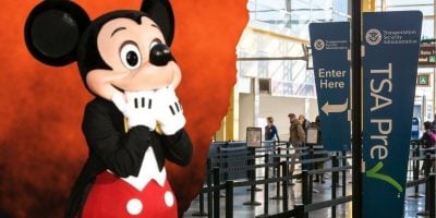 Mickey Mouse on a red background is edited next to an airport security checkpoint with TSA PreCheck signs and barriers at Orlando International Airport, where Disney World vacation plans are happening.