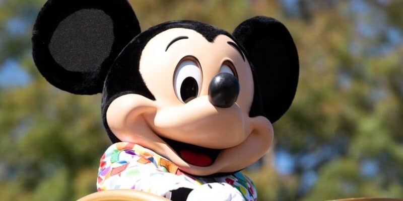 Mickey Mouse in a cavalcade at Magic Kingdom Park.