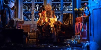 Captain Jack Sparrow on a throne on the Pirates of the Caribbean ride