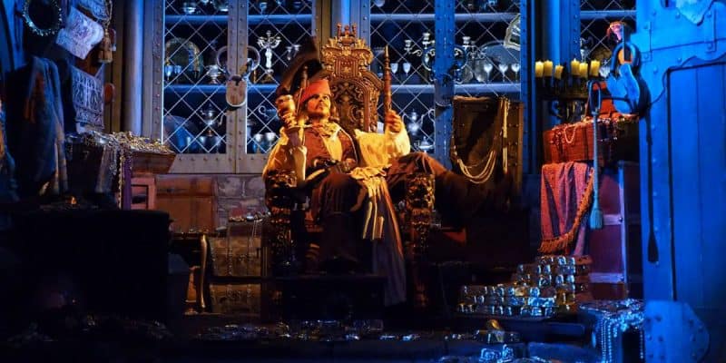 Captain Jack Sparrow on a throne on the Pirates of the Caribbean ride
