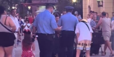 Disney security confronts a family at EPCOT.