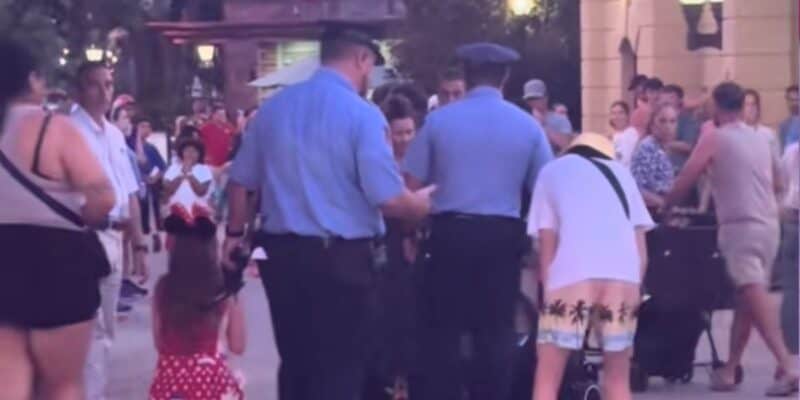 Disney security confronts a family at EPCOT.