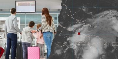 A family with luggage watches an airport departure screen, while a weather map highlights a developing situation with a red X over the Caribbean—potentially affecting guests on Disney vacations.