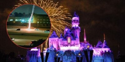 A brightly lit Disneyland castle at night with fireworks in the sky, overlaid with a circular inset showing fireworks exploding near cars on a highway, creating a surreal contrast between the magic of Disneyland and real-world celebrations.