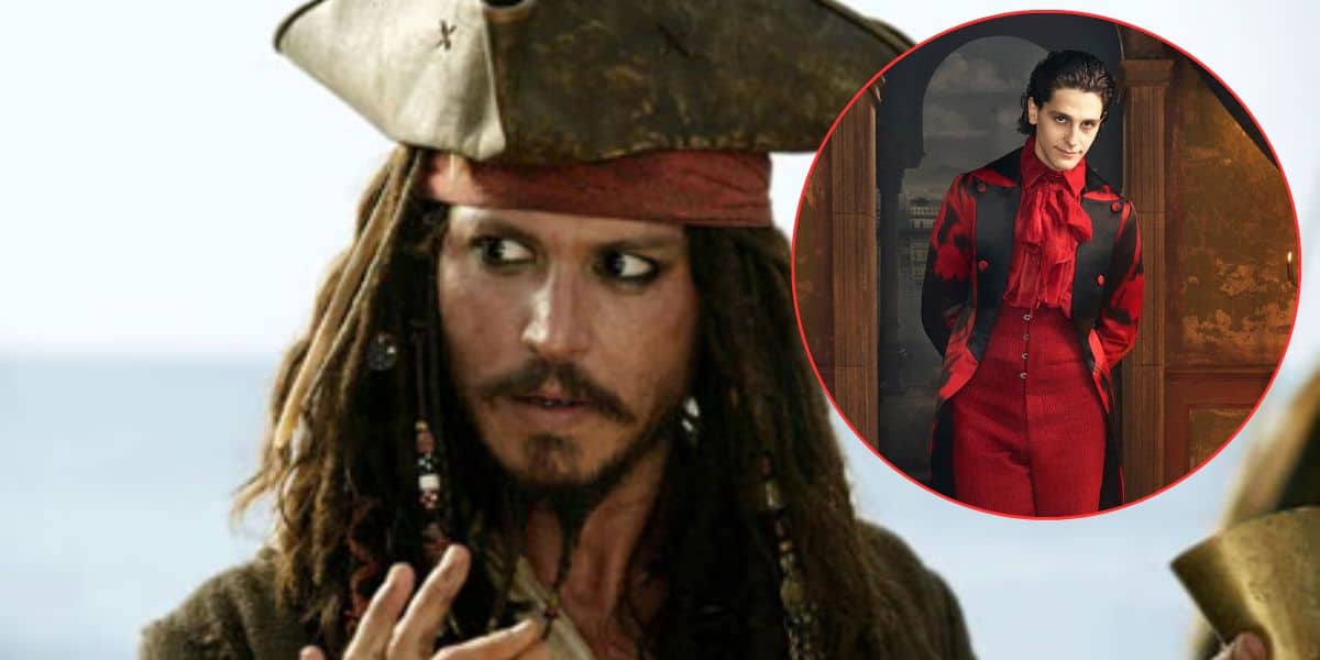 A person dressed as a pirate with dreadlocks, a brown hat, and dark eye makeup is in the foreground. In the corner, there’s an inset of another person in a red and black suit, standing indoors.