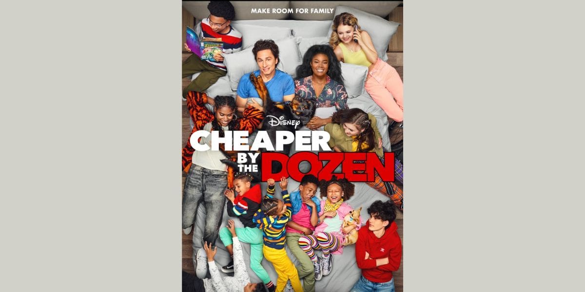 A large, diverse family of adults and children lies together on a bed, smiling and laughing. The poster reads “Disney Cheaper by the Dozen” in bold white and red letters. The tagline above says, “Make room for Disney family.”.