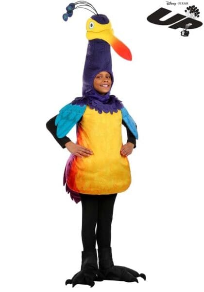 A child smiles while wearing a colorful bird costume inspired by Kevin from Disney Pixar's "Up." This playful Disney costume features a big orange beak, blue and purple feathers, black bird feet, and the "Up" logo in the top right corner.