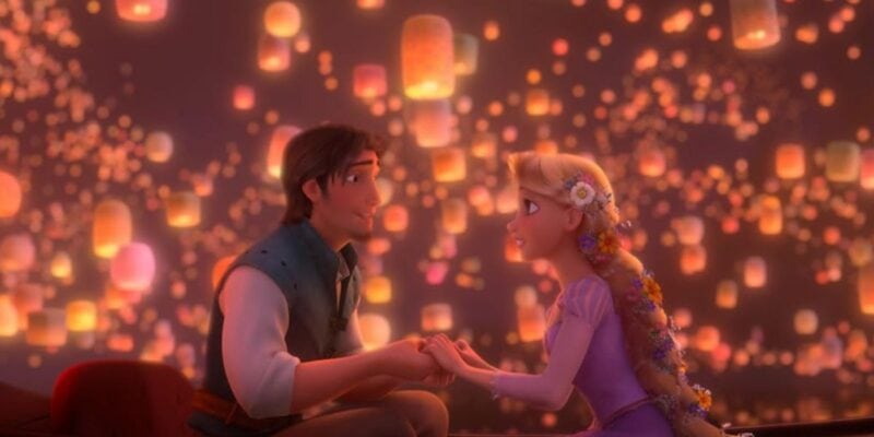 Animated scene of a man and a woman sitting together in a boat at night, holding hands and gazing at each other, surrounded by hundreds of glowing floating lanterns filling the sky.