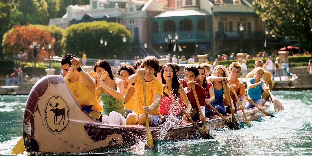 Guests on the Davy Crockett's Explorer Canoes at Disneyland