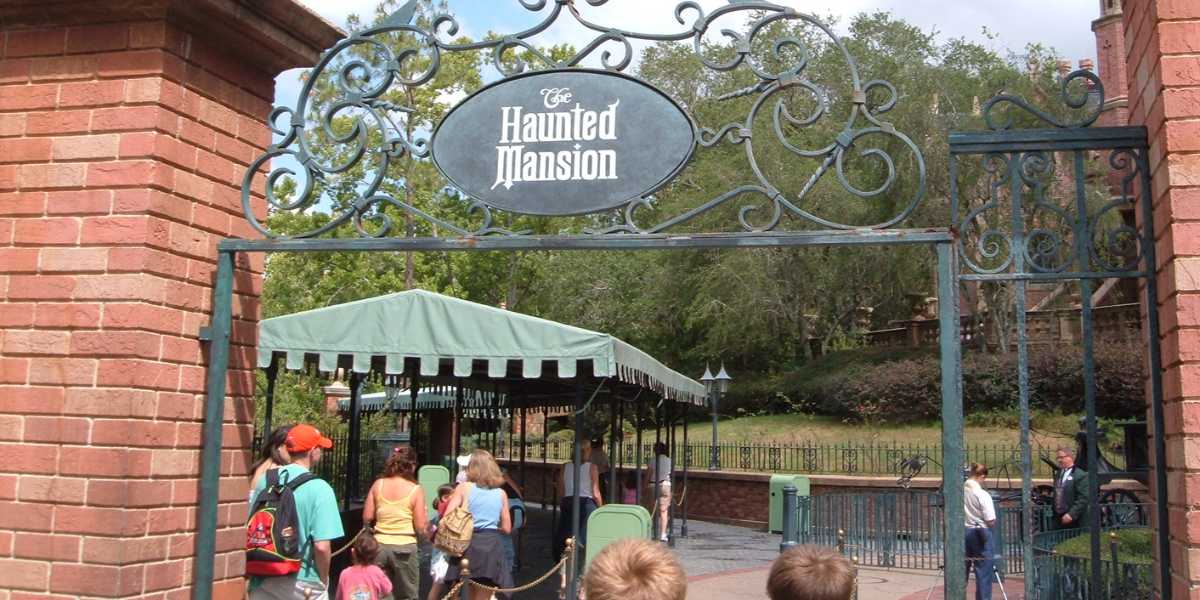 Visitors enter The Haunted Mansion attraction at Disney World
