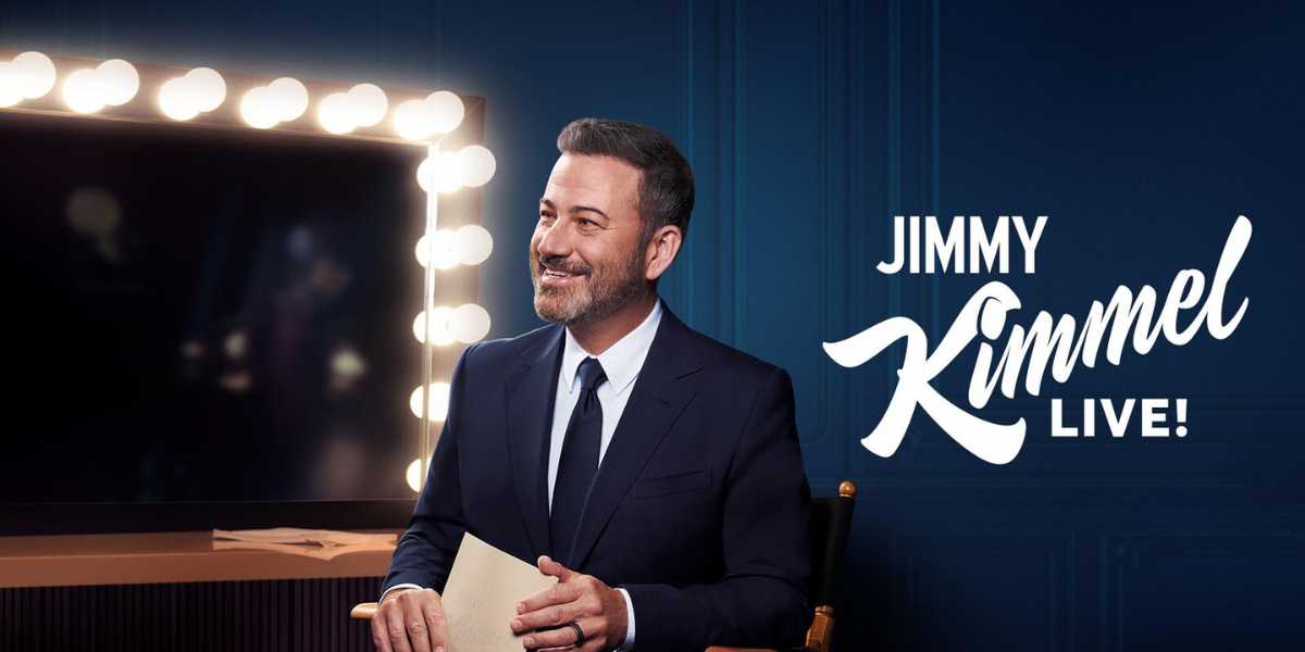 Jimmy Kimmel sat in front of a mirror with "Jimmy Kimmel Live!" written on the right