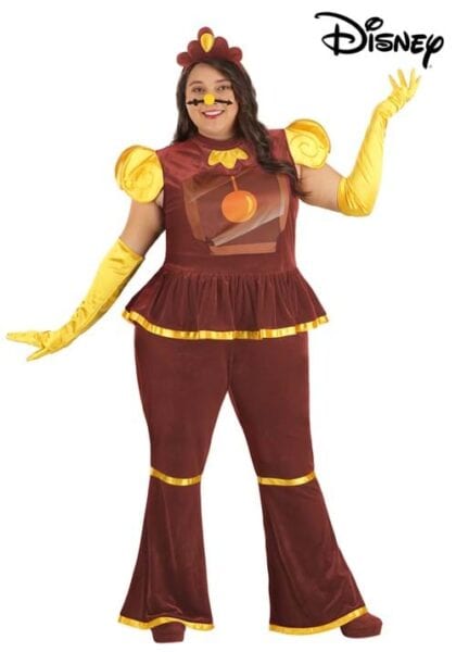 Dressed in one of the best Disney costumes, a woman in a Disney Cogsworth outfit from "Beauty and the Beast" wears brown with yellow trim, yellow gloves, and a clock face hat, smiling brightly with one arm raised.