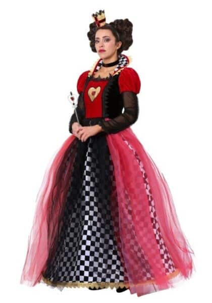 A woman dressed as the Queen of Hearts from Alice in Wonderland, wearing a crown, red and black gown with heart details, puffed sleeves, checkered skirt, and holding a white rabbit scepter—one of the best Disney costumes for witchful thinking.