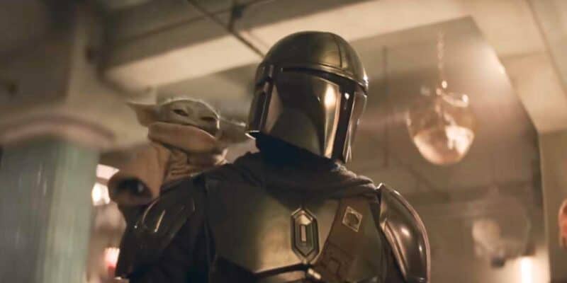 The Mandalorian (Pedro Pascal) and Grogu on his shoulder