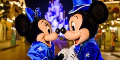 Minnie Mouse and Mickey Mouse on Main Street, U.S.A. at nighttime