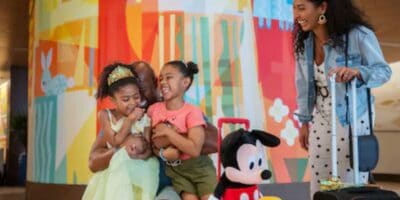 family in the lobby of a Disney hotel