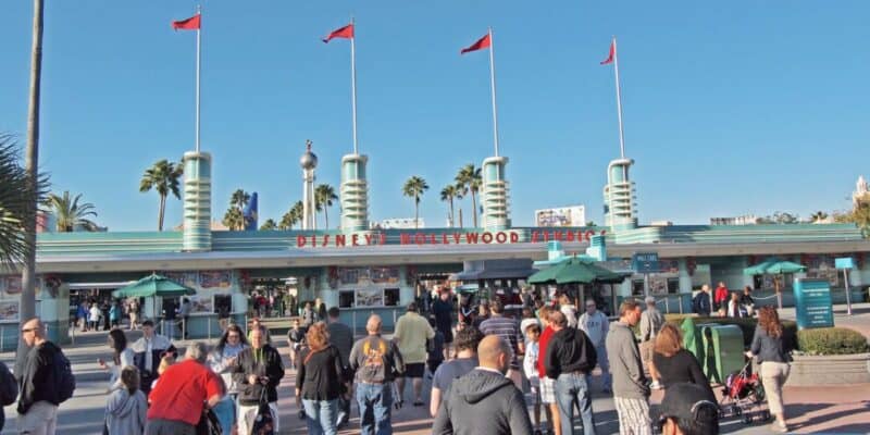 Guests stream into Disney's Hollywood Studios through the main entrance.
