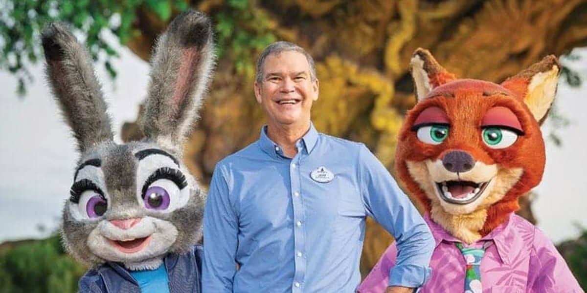 Jeff Vahle poses with 'Zootopia' characters Nick & Judy Hopps in front of the Tree of Life at Disney's Animal Kingdom Theme Park.