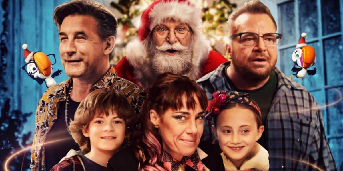 A group photo featuring Santa Claus in the center, surrounded by two men, a woman, and two children, with festive decorations and two cartoon birds wearing hats in the background inspired by disney+.