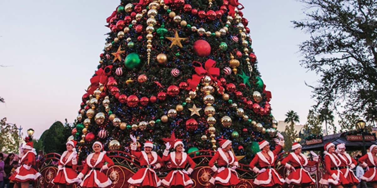 performers around giant Christmas tree at Universal Studios Florida