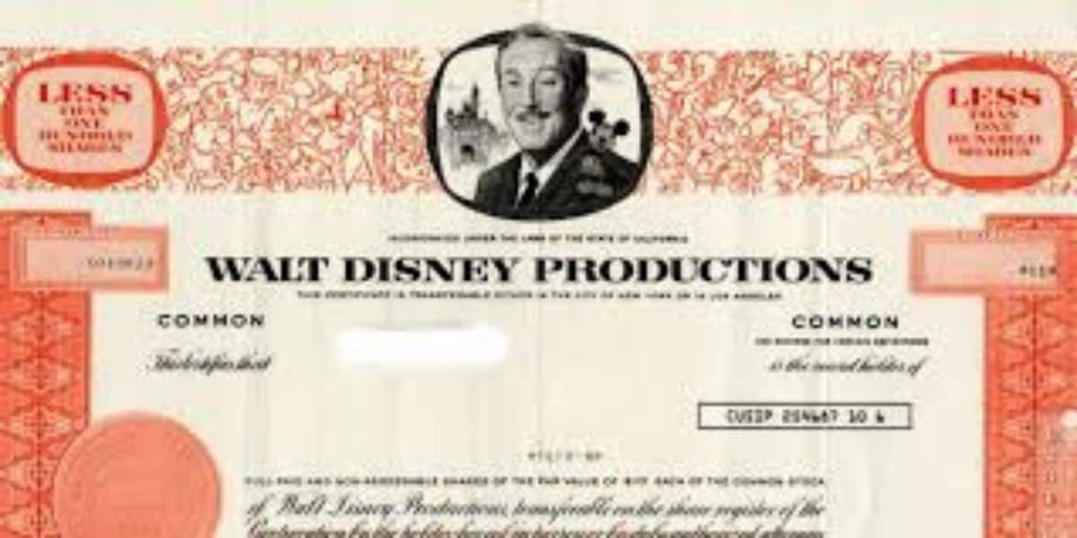 Walt Disney Productions stock certificate with Walt’s portrait, a bold red border, and magical Mary Poppins flair—Disney nostalgia!.